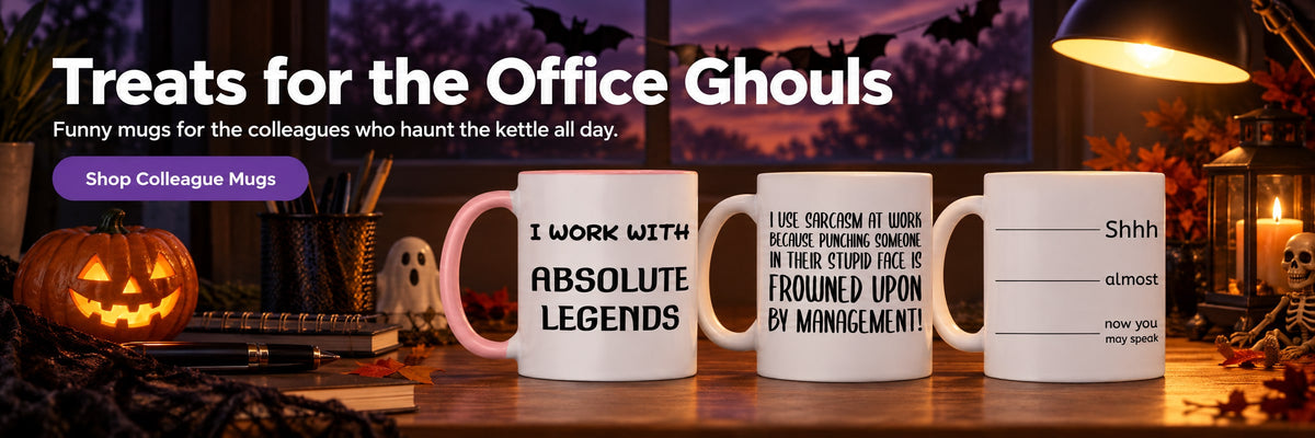 Treats for the Office Ghouls. Funny mugs for the colleagues who haunt the kettle all day. Shop Colleague Mugs. Three funny colleague mugs on an office desk at dusk with a small pumpkin and paper bats.