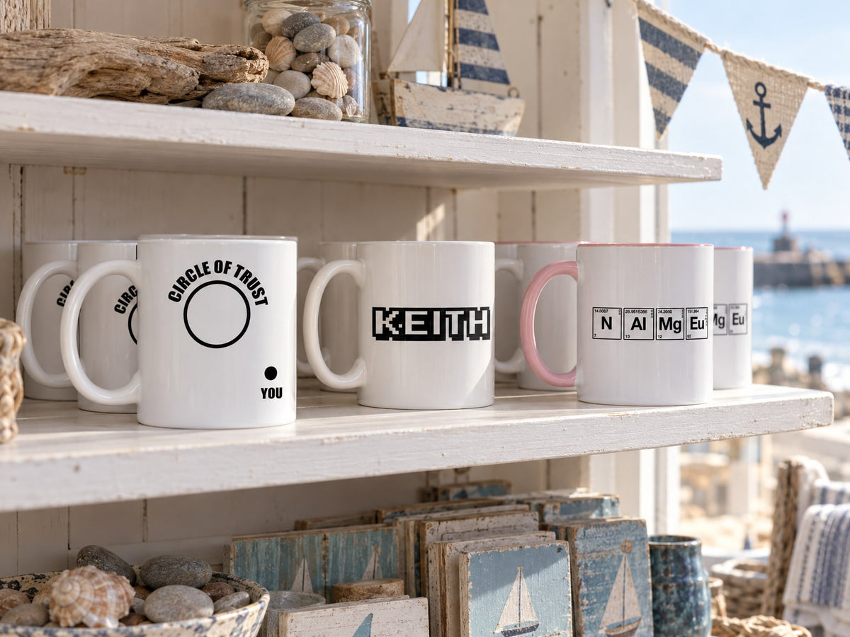 Our mugs on a seaside gift shop’s shelves: Circle of Trust Mug, Keith - Arcade Themed Mug, Chemistry Themed Personalised Mug