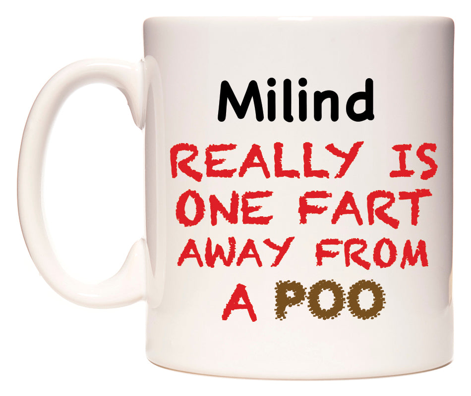 This mug features Milind Really is ONE Fart Away from A Poo
