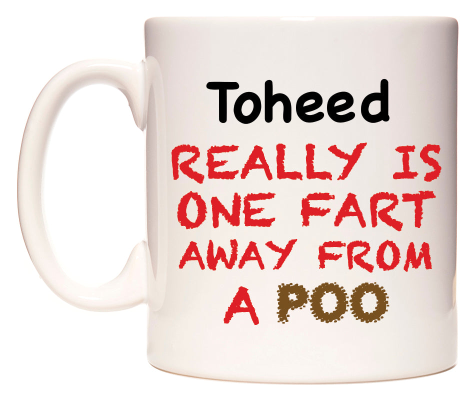 This mug features Toheed Really is ONE Fart Away from A Poo