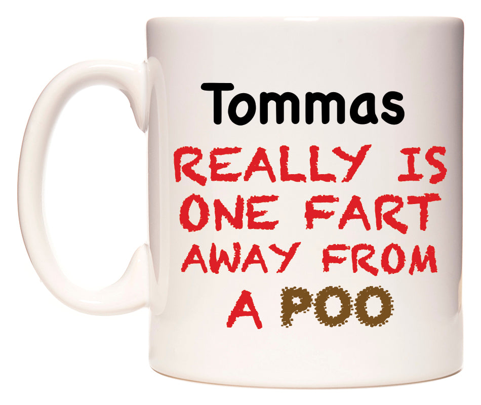 This mug features Tommas Really is ONE Fart Away from A Poo