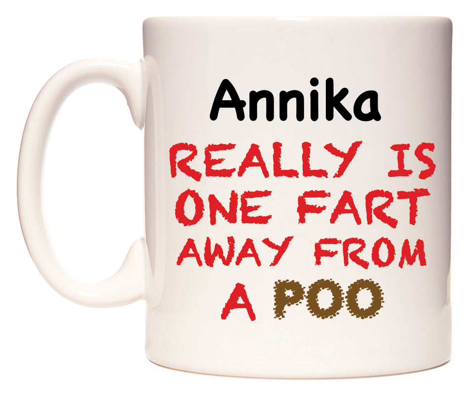 This mug features Annika Really is ONE Fart Away from A Poo