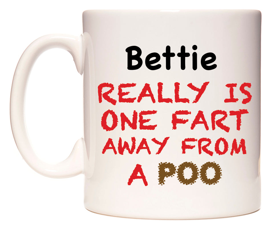 This mug features Bettie Really is ONE Fart Away from A Poo