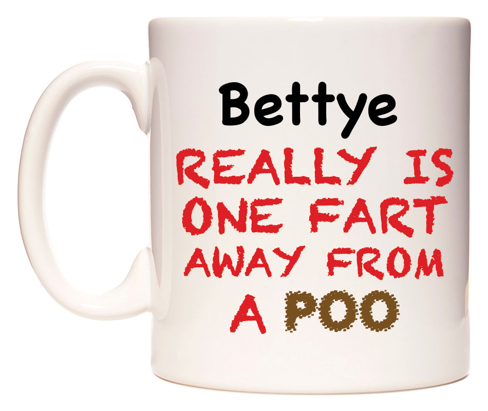 This mug features Bettye Really is ONE Fart Away from A Poo