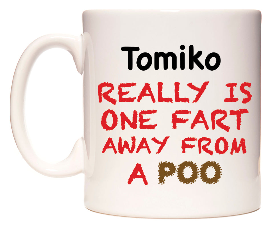 This mug features Tomiko Really is ONE Fart Away from A Poo