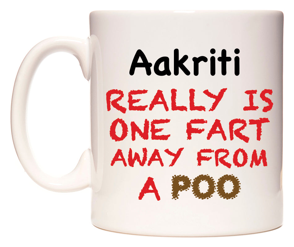 This mug features Aakriti Really is ONE Fart Away from A Poo