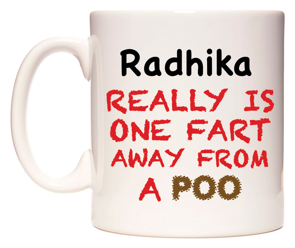 This mug features Radhika Really is ONE Fart Away from A Poo