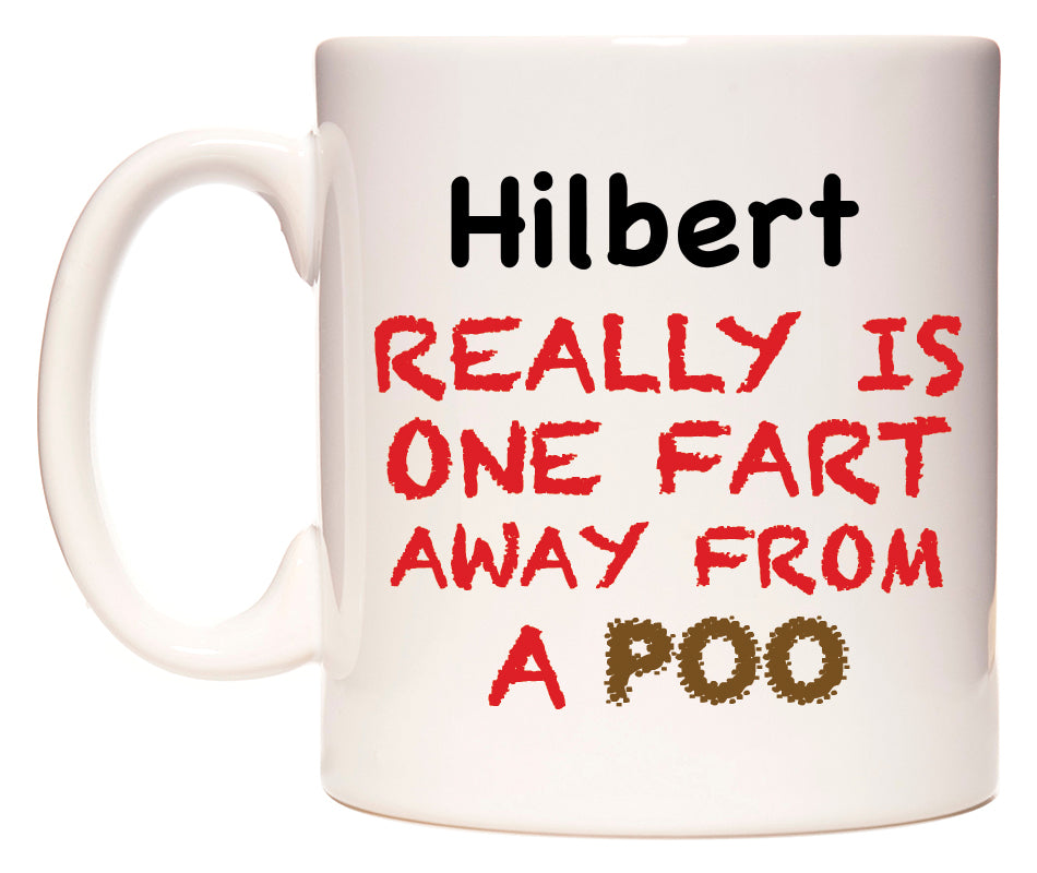 This mug features Hilbert Really is ONE Fart Away from A Poo