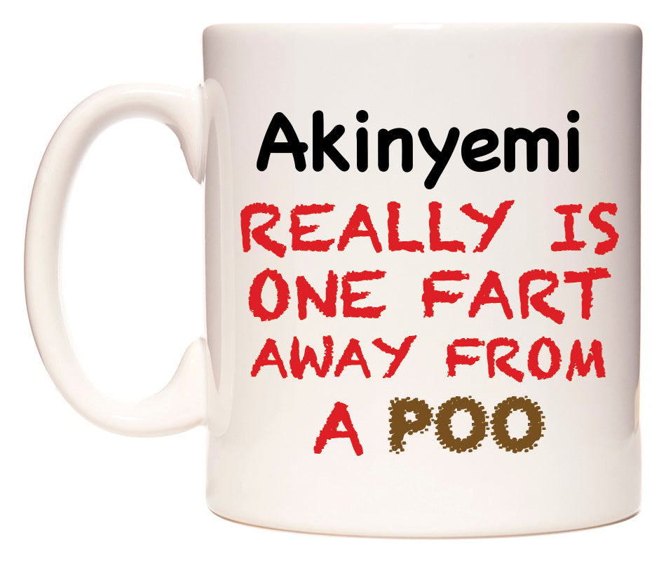 This mug features Akinyemi Really is ONE Fart Away from A Poo
