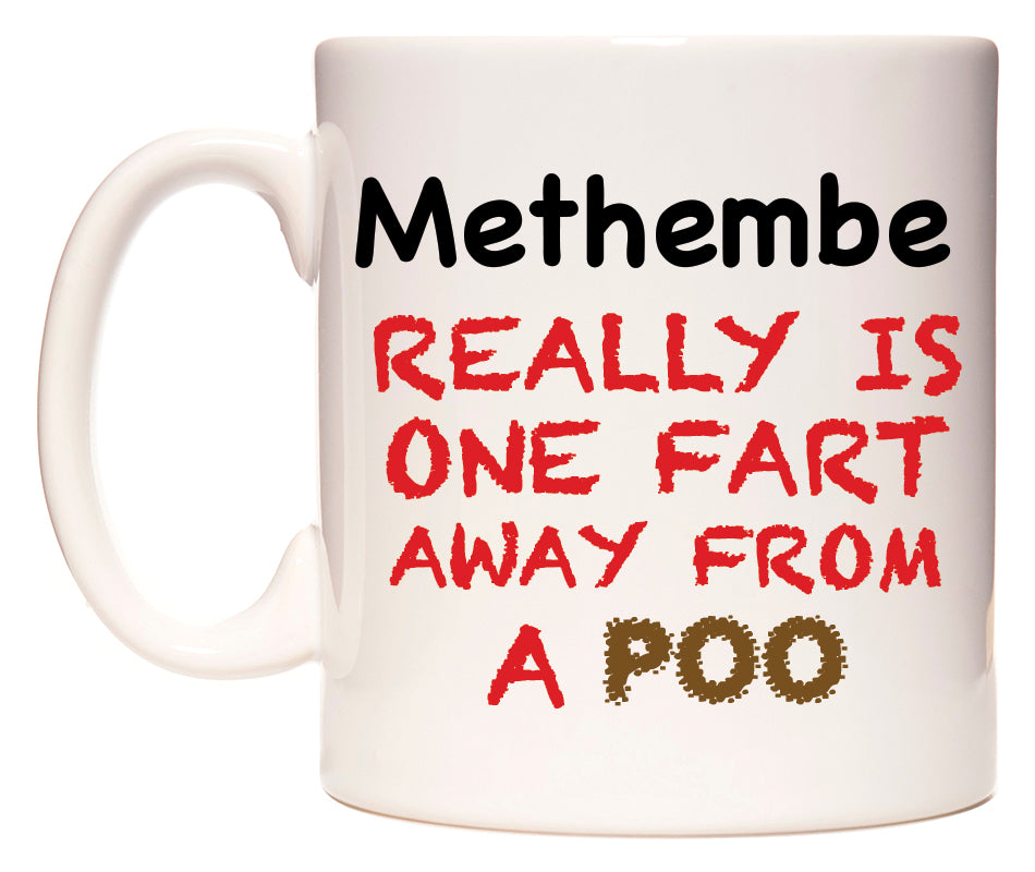 This mug features Methembe Really is ONE Fart Away from A Poo