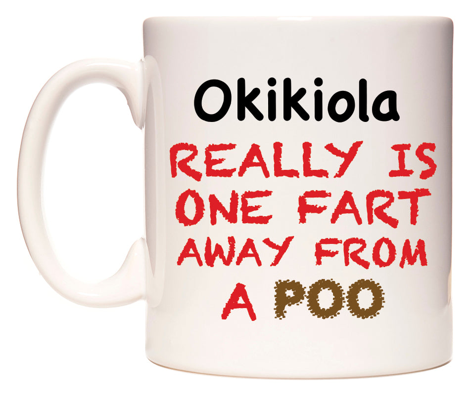 This mug features Okikiola Really is ONE Fart Away from A Poo