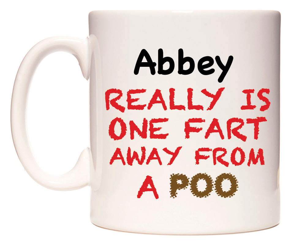 This mug features Abbey Really is ONE Fart Away from A Poo