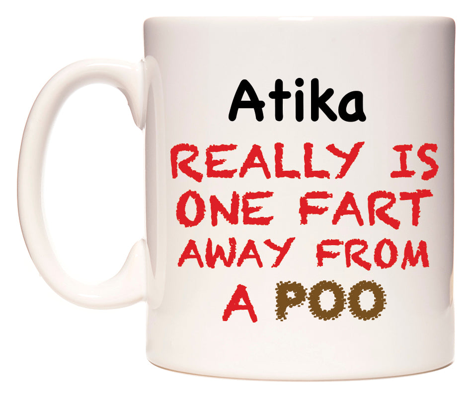 This mug features Atika Really is ONE Fart Away from A Poo