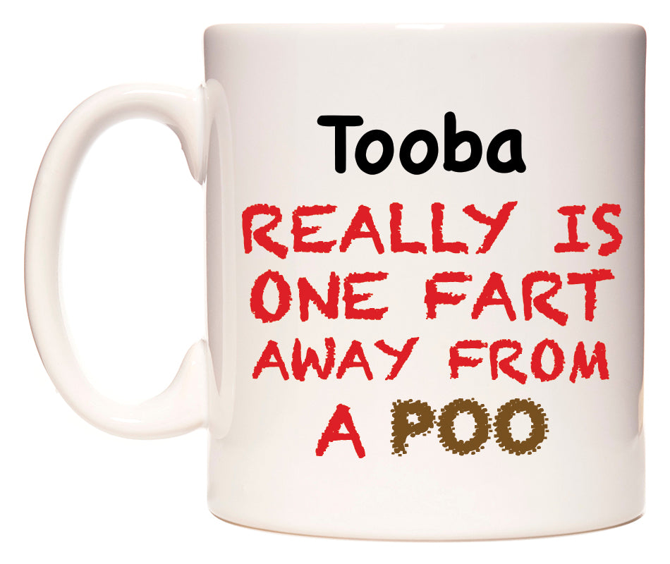This mug features Tooba Really is ONE Fart Away from A Poo