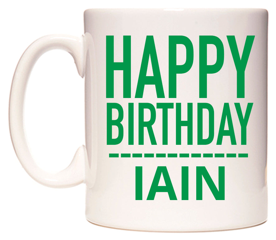 This mug features Happy Birthday Iain (Plain Green)